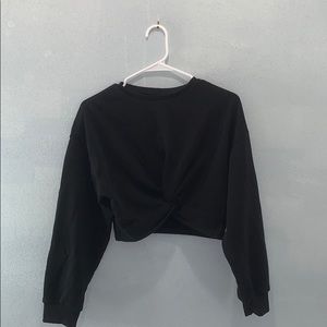 Black cropped pullover.